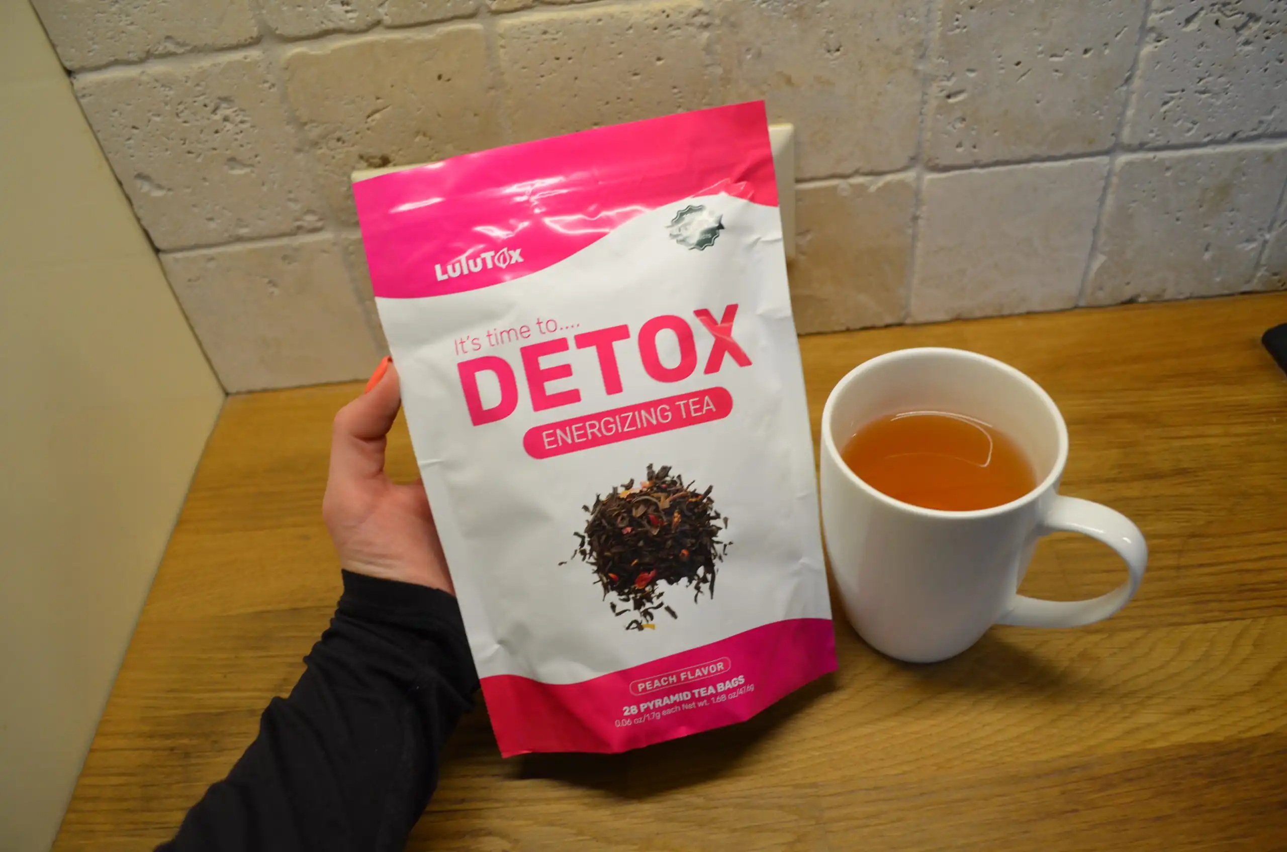 lulutox beg and cup in my hand
